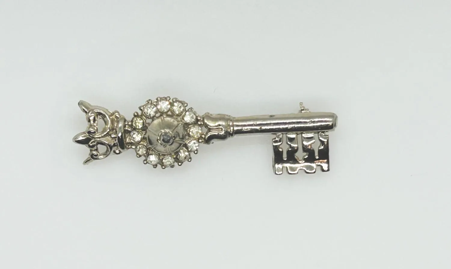 Regal Vintage Rhinestone Crowned Key Brooch